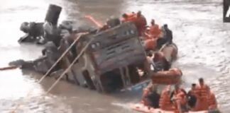Watch: Rescue teams try to pull out truck after Gujarat bridge collapse; 10 dead, several injured | India News